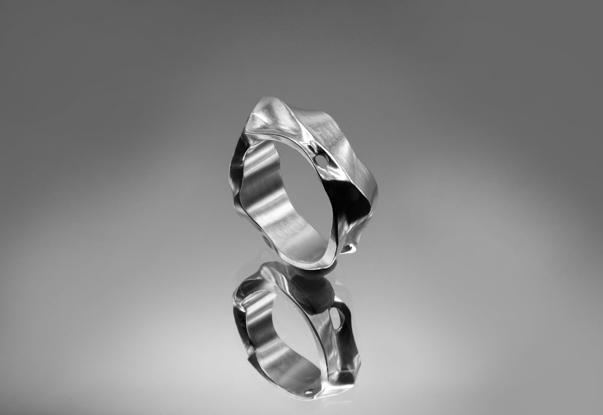 Entangled silver wire ring in a grunge optic